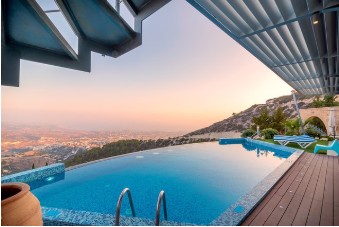 swimming pool overlooking hills 